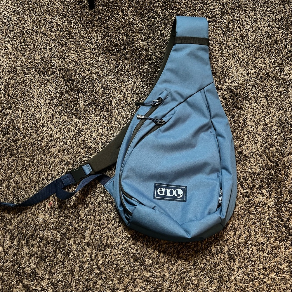 Eno brand kanga sling bag. Used a handful of times. Like new.